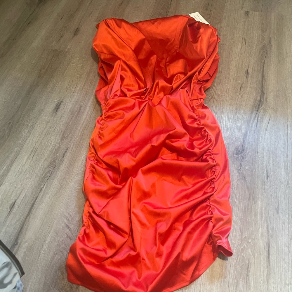 Glamaker dress with shoulder pads. Size large. Red. New with tags. Never worn.